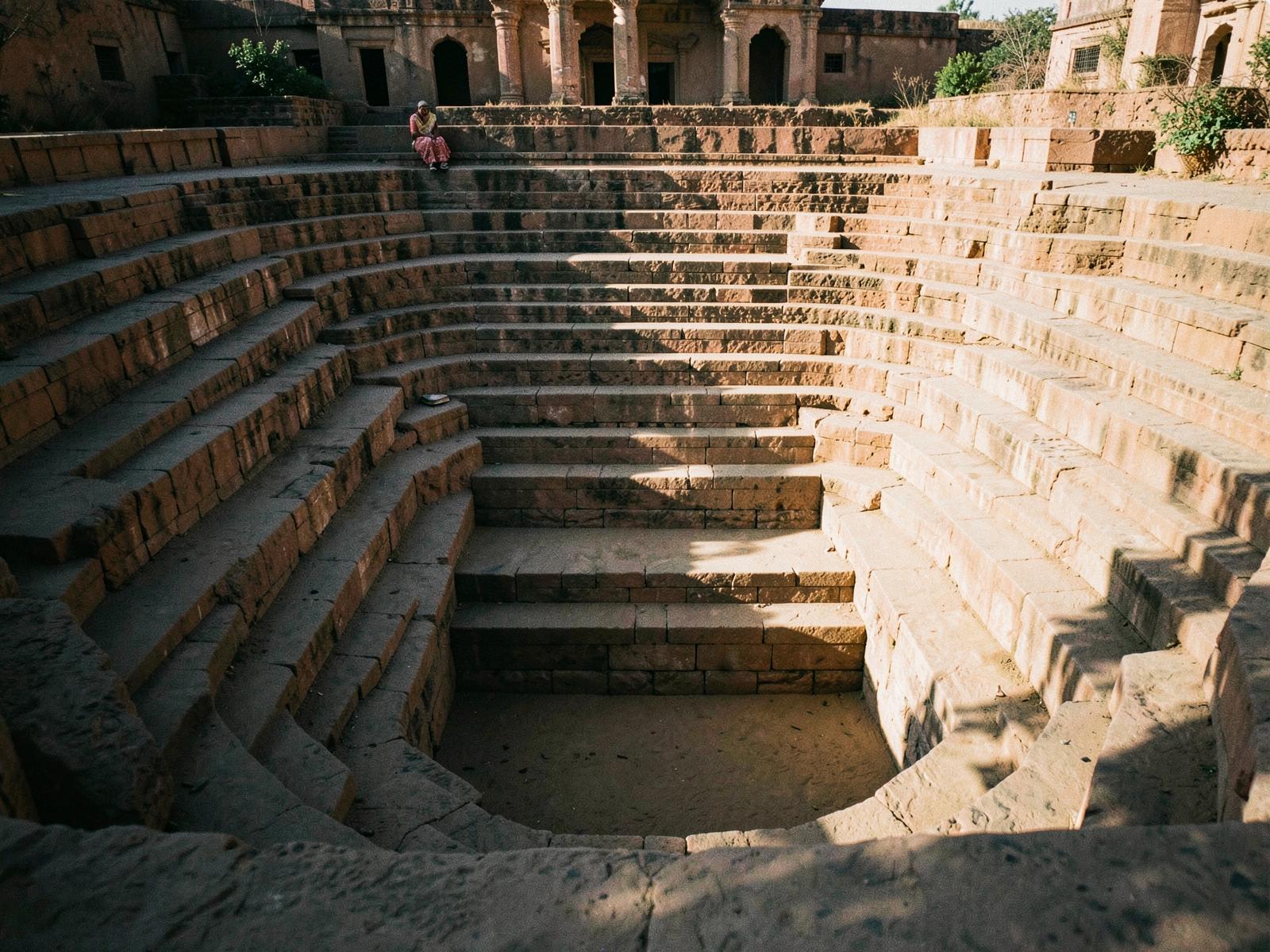 Carved sandstone palace arches in warm light